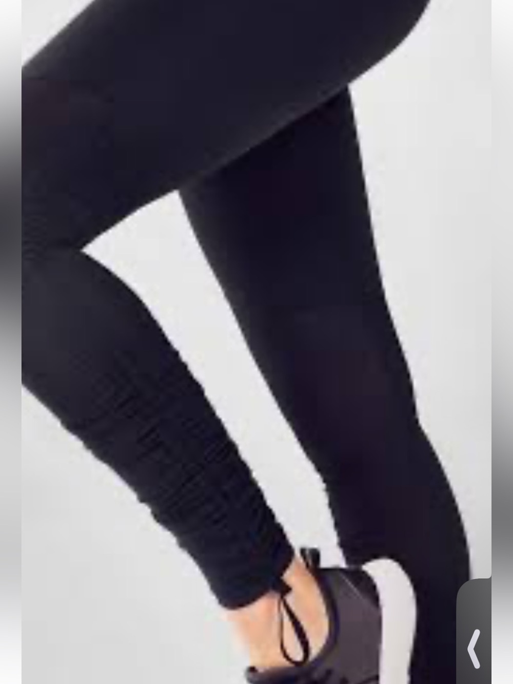 NET Fabletics black leggings with ruched side details with ties at the ankles